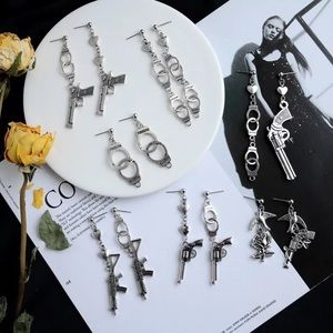 Unique asymmetric gun handcuff Earring Silver